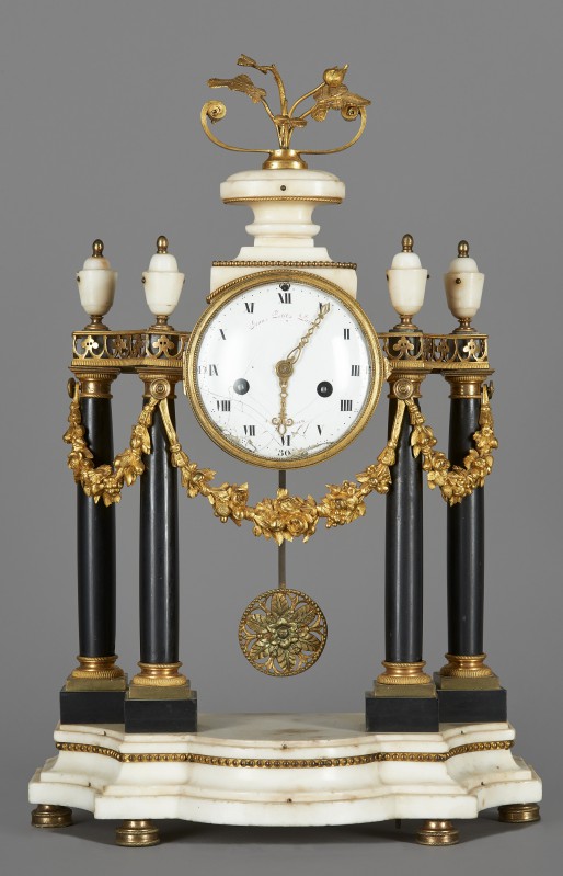 Classicist mantle clock in a portico form case