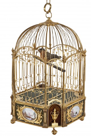 Musical clock in the form of a cage with bird - 1
