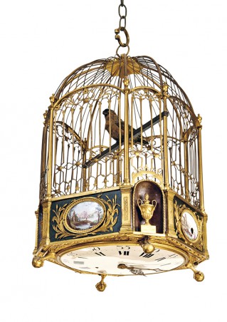 Musical clock in the form of a cage with bird - 4